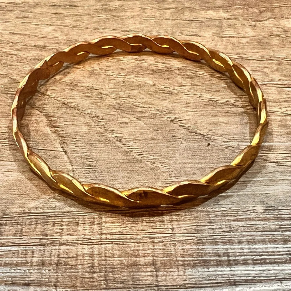 Golden Bangle with Intertwined Design